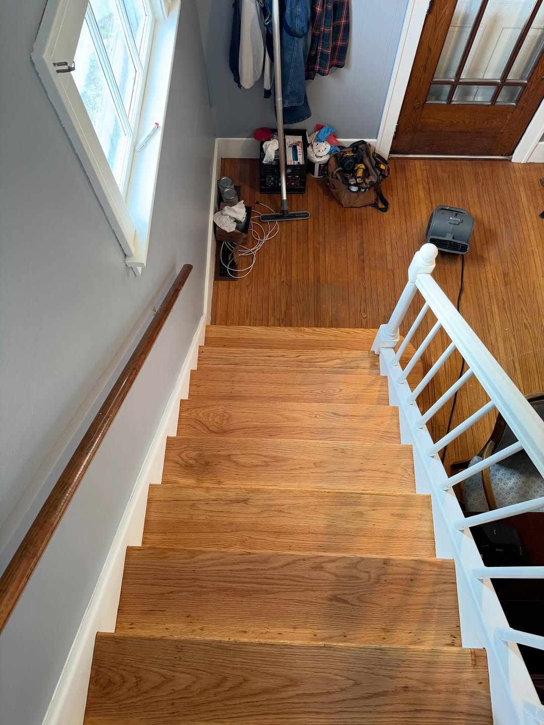 Before and after dark stain hardwood floor transformation
